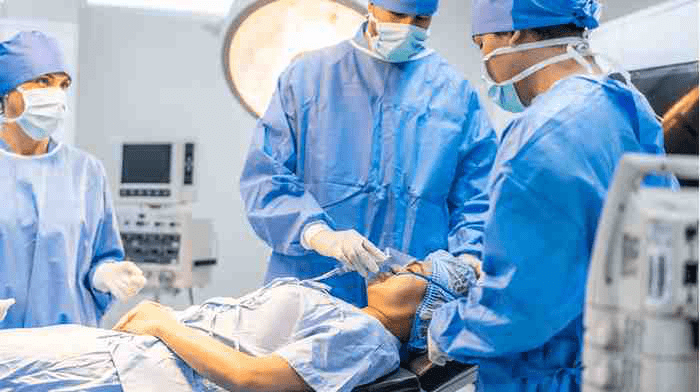 A group of Anesthesia residents and their patient.